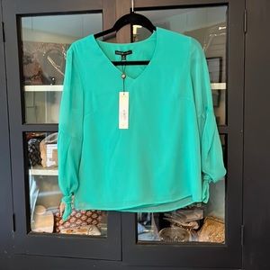 Net Dora Landa vneck blouse.